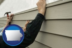 iowa map icon and installing vinyl siding on a house