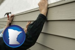 minnesota map icon and installing vinyl siding on a house
