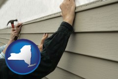 new-york map icon and installing vinyl siding on a house