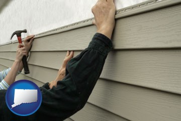 installing vinyl siding on a house - with Connecticut icon