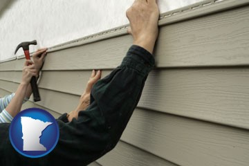 installing vinyl siding on a house - with Minnesota icon