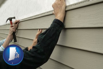 installing vinyl siding on a house - with Rhode Island icon