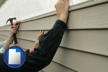 installing vinyl siding on a house - with Utah icon