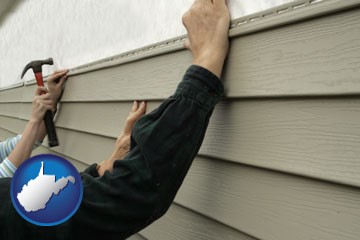 installing vinyl siding on a house - with West Virginia icon