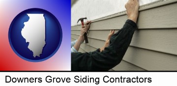 installing vinyl siding on a house in Downers Grove, IL