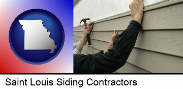 installing vinyl siding on a house in Saint Louis, MO